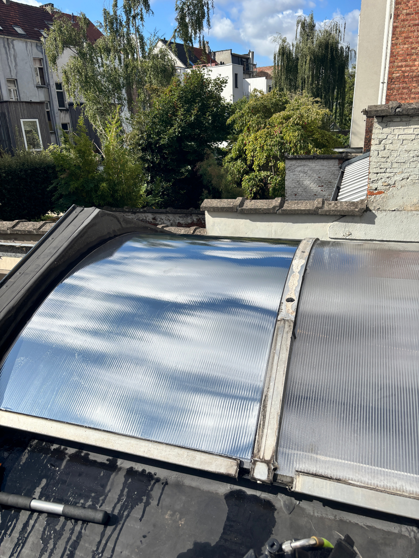 Hittewerende folie op atrium lichtstraat